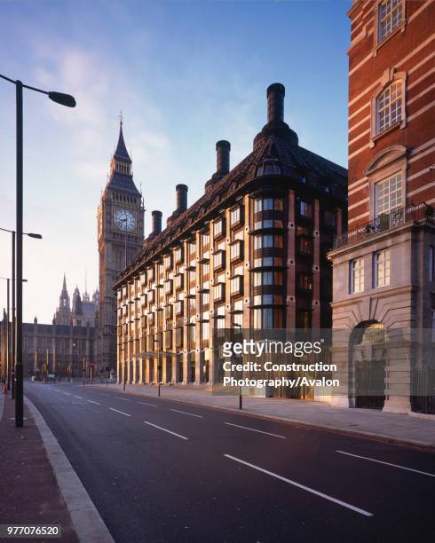 Morning Shot of Portcullis House, opposite Westminster's Houses of Parliament and Big Ben, London The new building, with offices for 210 Members of...
