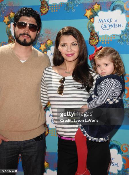 Alejandro Gomez Monteverde, Ali Landry and Estela Monteverde attend the Make-A-Wish Foundation event at Santa Monica Pier on March 14, 2010 in Santa...