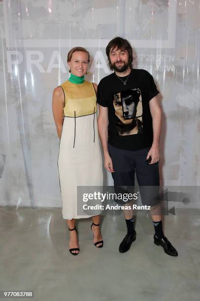 Olivia Scarry and Francesco Vezzoli attend Prada Men's Spring/Summer 2019 Fashion Show on June 17, 2018 in Milan, Italy.