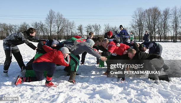 Lithuanian rugby team players train in Siauliai on March 6, 2010. Rising from the depths of Europe's rugby pool, Lithuania can allow themselves a...