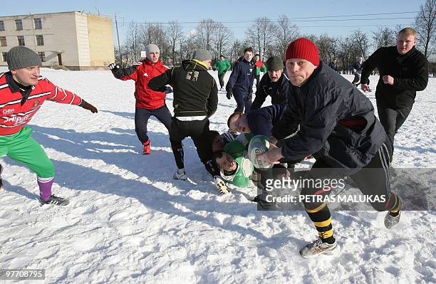 Lithuanian rugby team players train in Siauliai on March 6, 2010. Rising from the depths of Europe's rugby pool, Lithuania can allow themselves a...