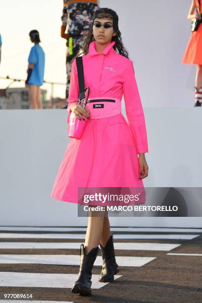 Model presents a creation for the fashion house Palm Angels during the Men's Spring/Summer 2019 fashion shows in Milan, on June 17, 2018.