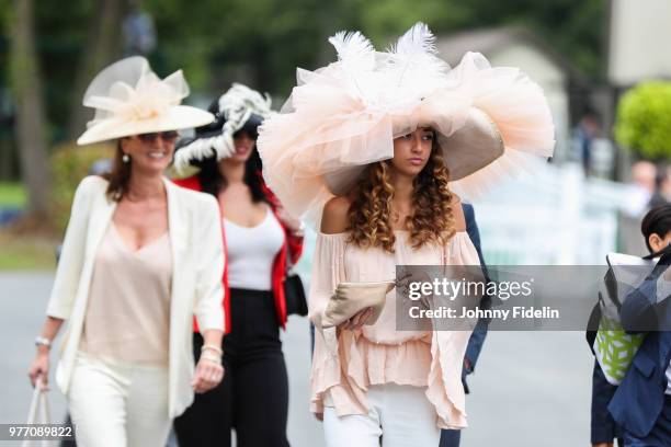 Illustration Extravagant Hats racegoer during the Grand Prix de Diane 2018 at Hippodrome de Chantilly on June 17, 2018 in Chantilly, France.