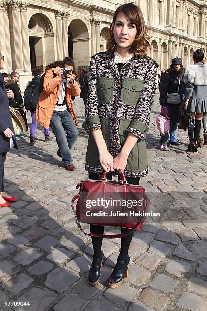 Alexa Chung leaves the Louis Vuitton Ready to Wear show as part of the Paris Womenswear Fashion Week Fall/Winter 2011 at Cour Carree du Louvre on...