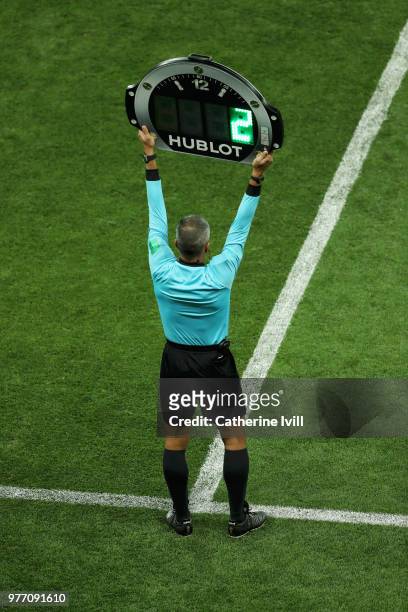 Fourth official John Pitti uses the LED board to show 2 minutes of added time at the end of the second half during the 2018 FIFA World Cup Russia...