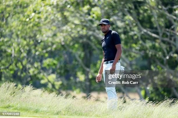 Tony Finau of the United States reacts to a shot from the fescue on the second green during the final round of the 2018 U.S. Open at Shinnecock Hills...