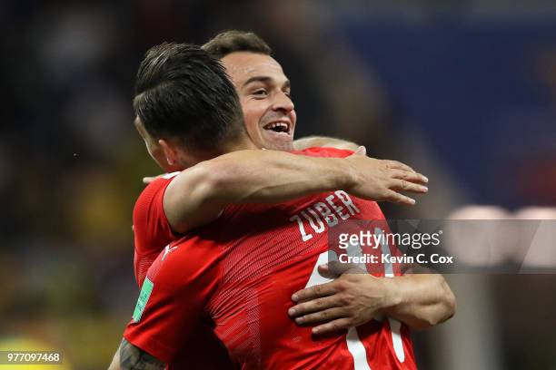 Steven Zuber of Switzerland celebrates with Xherdan Shaqiri after scoring his team's first goal during the 2018 FIFA World Cup Russia group E match...