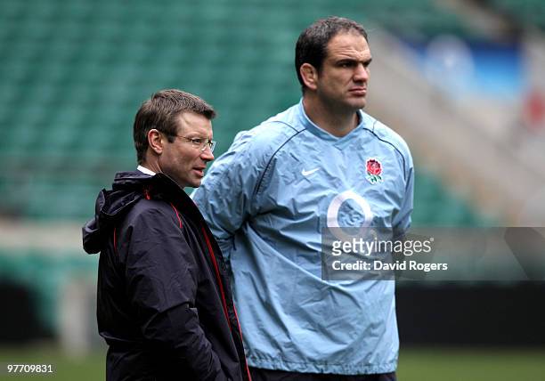 Martin Johnson the England Manager talks to Rob Andrew, the RFU director of elite rugby during the England training session held at Twickenham...