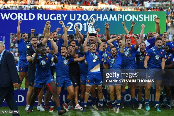 France's players celebrate with the trophy after winning the U20 World Rugby Union championship final match England vs France at the Mediterranean...