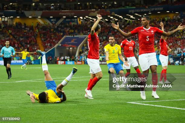 Gabriel Jesus of Brazil is challenged in the penalty area by Manuel Akanji of Switzerland during the 2018 FIFA World Cup Russia group E match between...