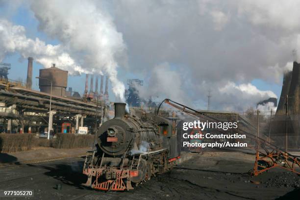 Chinese SY Class industrial Mikado 2-8-2 on the coaling road at Baotou Steelworks, Inner Mongolia. March 2005.