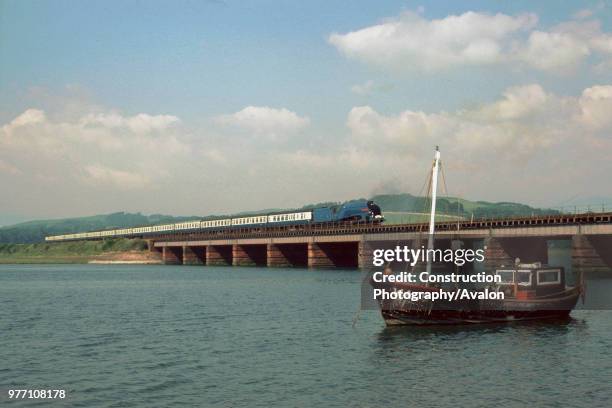 Cumbrian Coast Express. No.4498 Sir Nigel Gresley crosses the river Esk, southbound for Carnforth. .