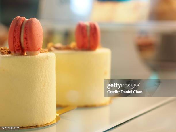 chiffon cake with macaroons on top - chiffon stock pictures, royalty-free photos & images