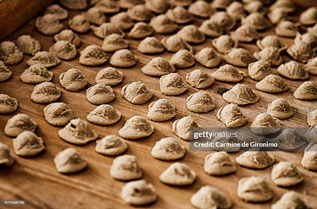 Orecchiette pasta on wooden background, Francavilla Fontana, Apulia, Italy