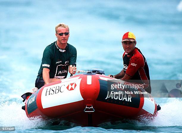 Eddie Irvine of Northern Ireland in a IRB surf rescue boat on Bondi Beach ahead of Sunday's Australian Grand Prix, Sydney, Australia. Mandatory...
