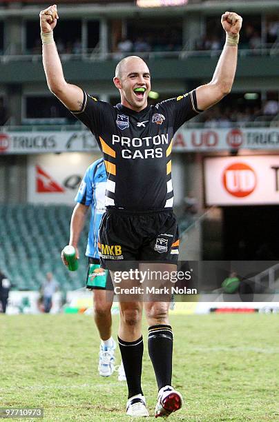 Liam Fulton of the Tigers celebrates winning the round one NRL match between the Wests Tigers and the Manly Warringah Sea Eagles at the Sydney...