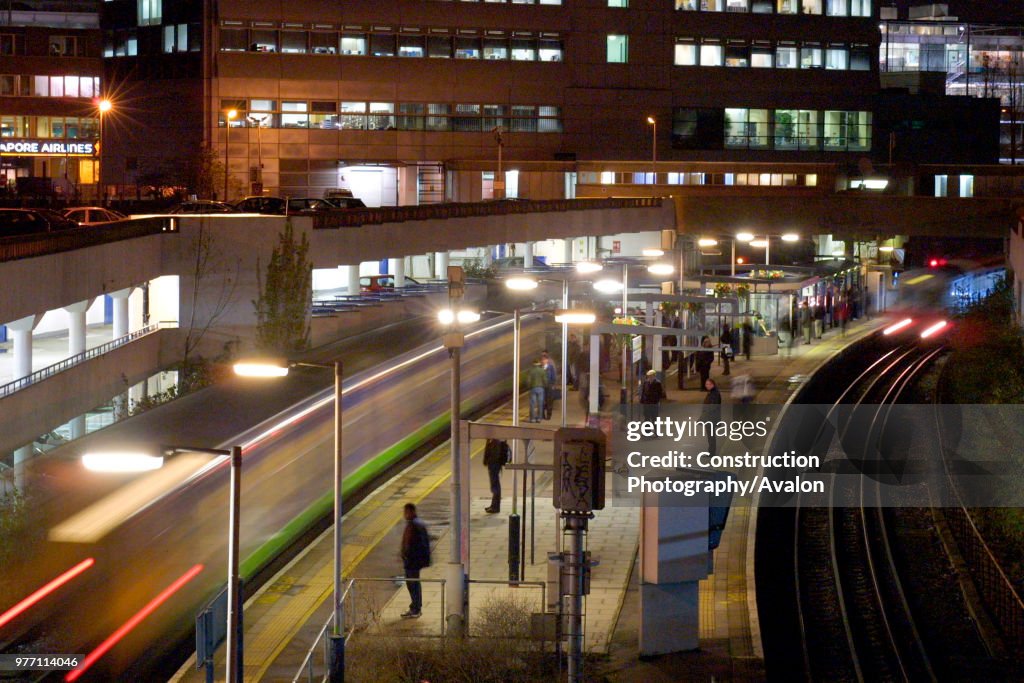 A Silverlink Metro service on approach to Gunnersby Station on the North London Line and The London Underground District Line