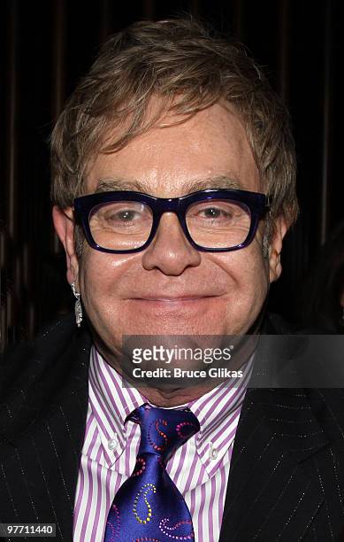 Elton John poses at the hit play "Next Fall" on Broadway at The Helen Hayes Theater on March 14, 2010 in New York City.