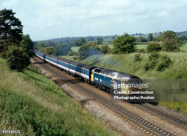 Aynho Mill. No 47664 heads north with the 06:34 ex Poole for Manchester. , United Kingdom.