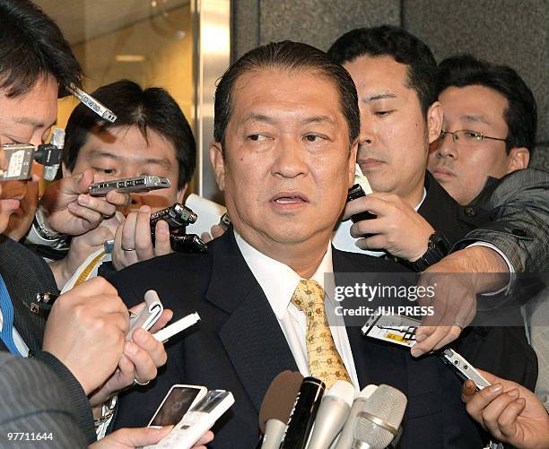 Kunio Hatoyama , the younger brother of Japanese Prime Minister Yukio Hatoyama, leaves his office after quitting the opposition conservative Liberal...