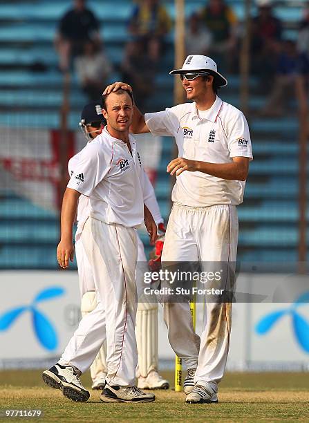 England bowler Steven Finn playfully rubs the head of Jonathan Trott during day four of the 1st Test match between Bangladesh and England at Jahur...