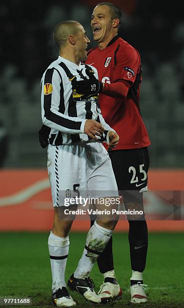 Fabio Cannavaro of Juventus FC reacts with Bobby Zamora of Fulham FC during the UEFA Europa League last 16, first leg match between Juventus FC and...