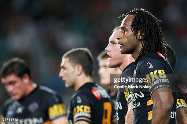 Lote Tuqiri of the Tigers watches on during the round one NRL match between the Wests Tigers and the Manly Warringah Sea Eagles at the Sydney...