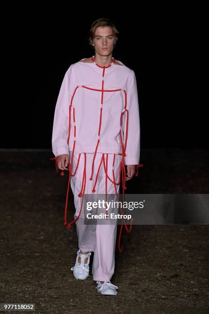 Model walks the runway at the Craig Green show during the 94th Pitti Immagine Uomo on June 14, 2018 in Florence, Italy.