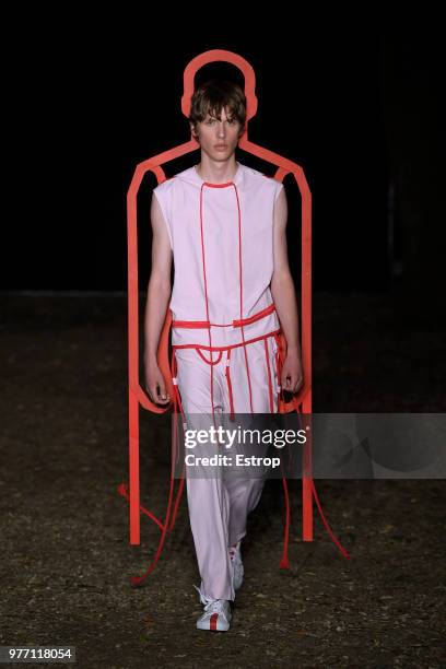 Model walks the runway at the Craig Green show during the 94th Pitti Immagine Uomo on June 14, 2018 in Florence, Italy.