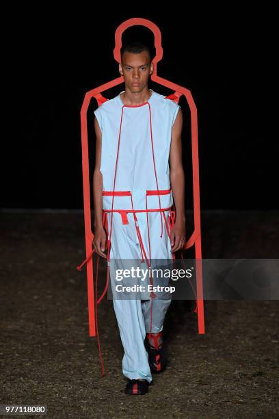 Model walks the runway at the Craig Green show during the 94th Pitti Immagine Uomo on June 14, 2018 in Florence, Italy.