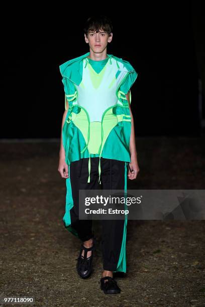 Model walks the runway at the Craig Green show during the 94th Pitti Immagine Uomo on June 14, 2018 in Florence, Italy.