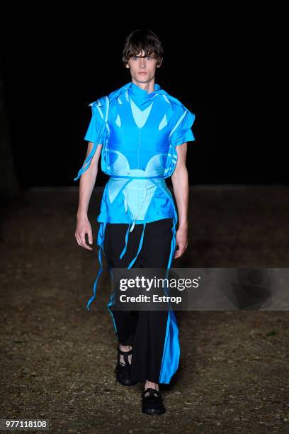 Model walks the runway at the Craig Green show during the 94th Pitti Immagine Uomo on June 14, 2018 in Florence, Italy.