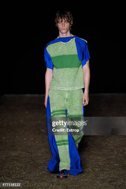 Model walks the runway at the Craig Green show during the 94th Pitti Immagine Uomo on June 14, 2018 in Florence, Italy.