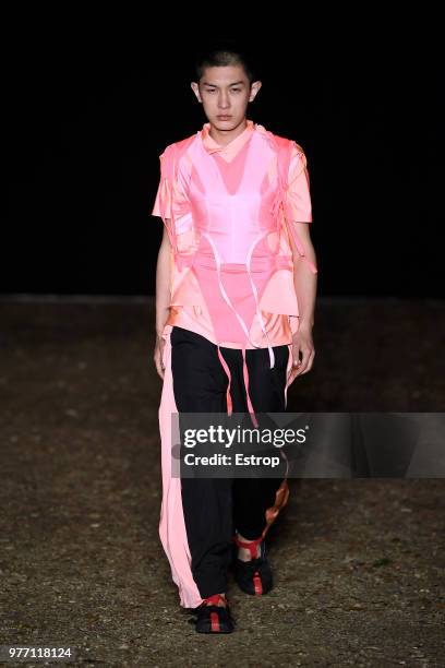 Model walks the runway at the Craig Green show during the 94th Pitti Immagine Uomo on June 14, 2018 in Florence, Italy.