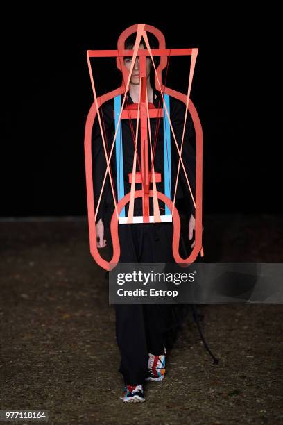 Model walks the runway at the Craig Green show during the 94th Pitti Immagine Uomo on June 14, 2018 in Florence, Italy.