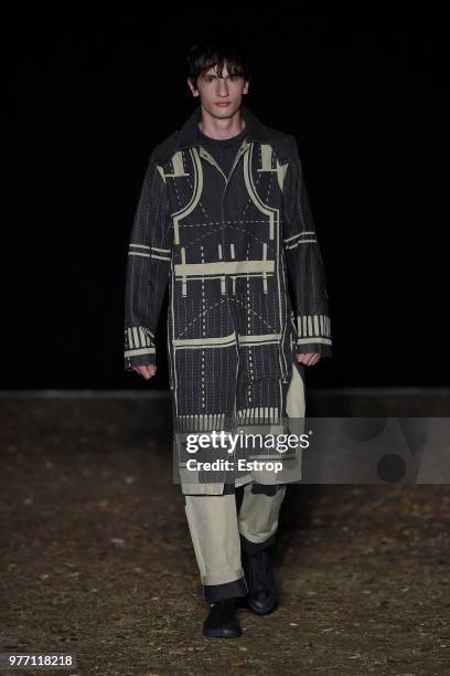 Model walks the runway at the Craig Green show during the 94th Pitti Immagine Uomo on June 14, 2018 in Florence, Italy.