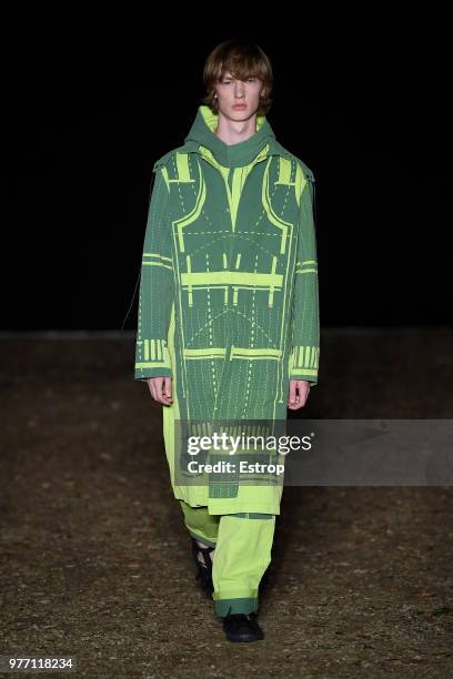 Model walks the runway at the Craig Green show during the 94th Pitti Immagine Uomo on June 14, 2018 in Florence, Italy.