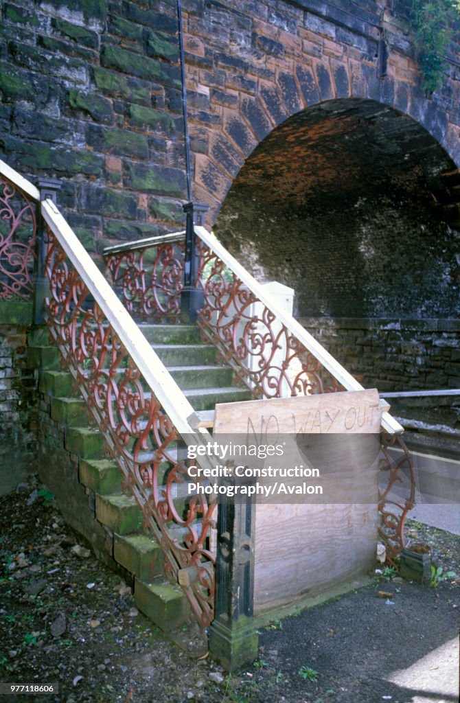 Derelect station footbridge with home made sign No way out. C 1993