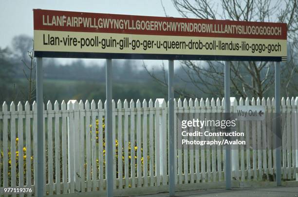 Llanfairpwllgwyngyllgogerychwyrndrobwllllantysiliogogogoch station sign in Anglesey. Britain's longest station name.