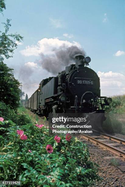 German Railway's Radebeul Ost -Radeburg line with meter gauge locomotive No 991781 2-10-2T leaving Moritzburg station on Monday 4 July 1977.