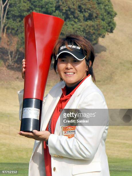 Wei Yun-Jye of Chinese Taipei poses with the trophy after winning the Yokohama Tire Golf Tournament PRGR Ladies Cup at Tosa Country Club on March 14,...