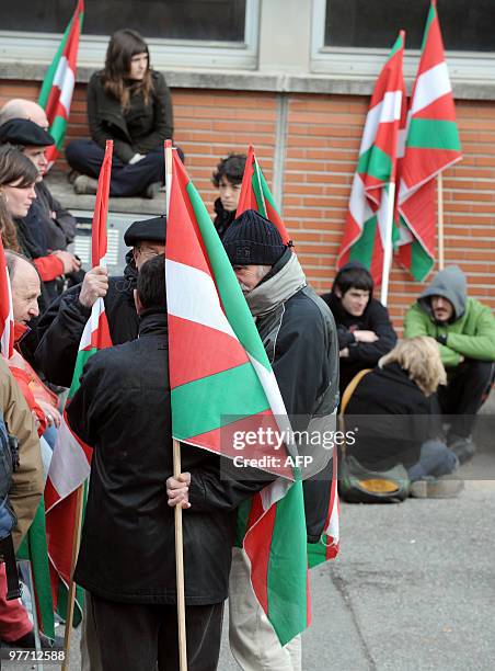 Members of the Joan Anza Committee, a member of the armed Basque separatist group ETA who disappeared nearly a year ago, gather in front of the...