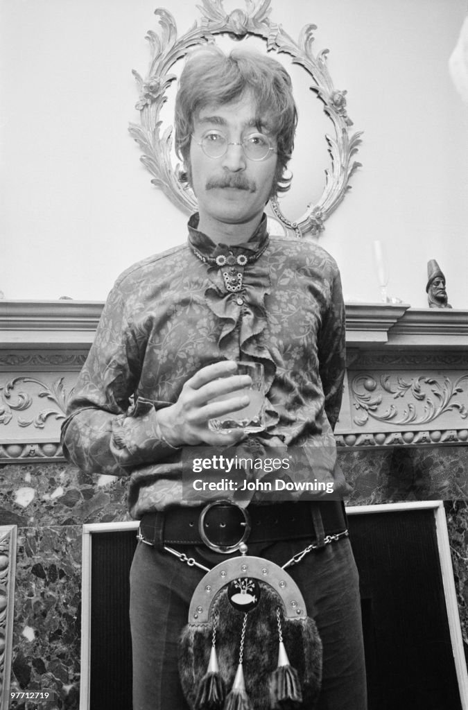 John Lennon wearing a frilly shirt and a sporran at the press launch ...