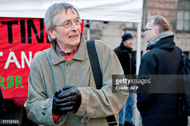 Veteran Danish left-wing activist Patrick MacManus , a founder of Forening Oproer , stands outside the Copenhagen court on March 15, 2010 after...