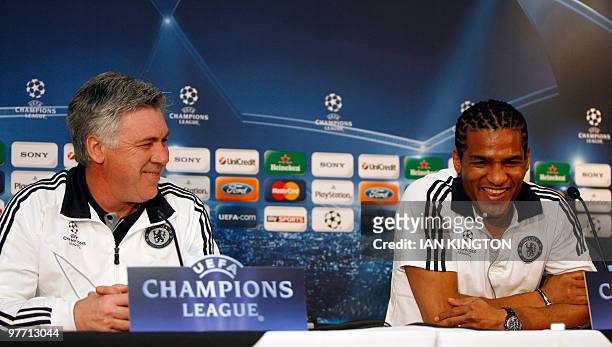 Chelsea's Italian Manager Carlo Ancelotti and Chelsea's French footballer Florent Malouda attend a press conference at Stamford Bridge, in London, on...