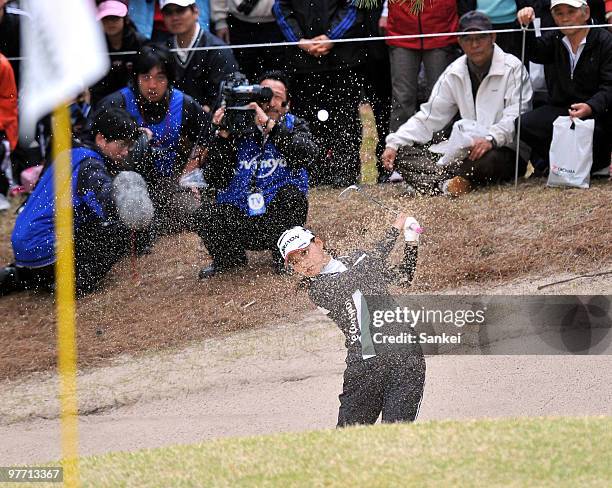 Sakura Yokomine hits out from a bunker at the 15th hole during the round two of the Yokohama Tire Golf Tournament PRGR Ladies Cup at Tosa Country...