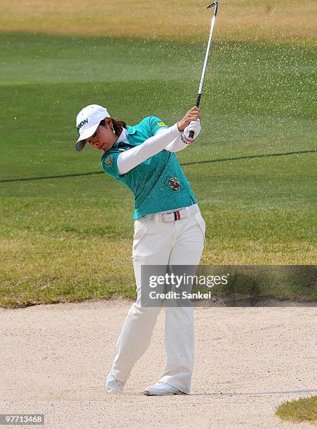 Rikako Morita hits out from a bunker at the 16th hole during the round one of the Yokohama Tire Golf Tournament PRGR Ladies Cup at Tosa Country Club...