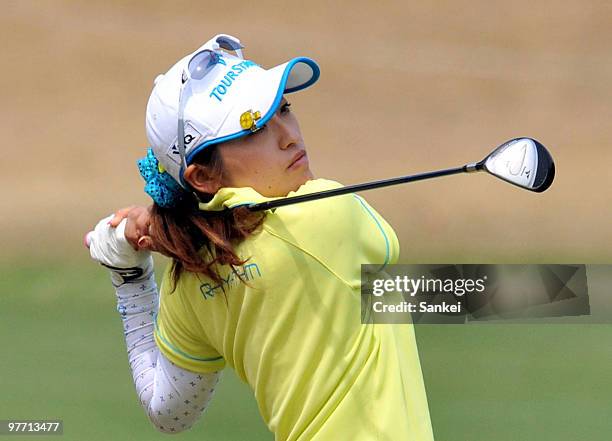 Mika Takushima hits a second shot at 9th hole during the round one of the Yokohama Tire Golf Tournament PRGR Ladies Cup at Tosa Country Club on March...