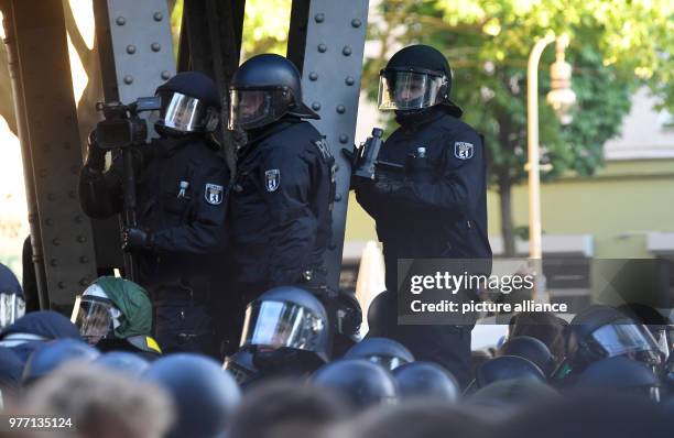 Dpatop - Police officers with videocameras film the 'May 1st Revolutionary march' on the occasion of the May Day in Berlin, Germany, 01 May 2018....