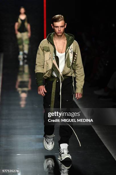 Model presents a creation by Dsquared2 during the men & women's spring/summer 2019 collection fashion shows in Milan, on June 17, 2018.